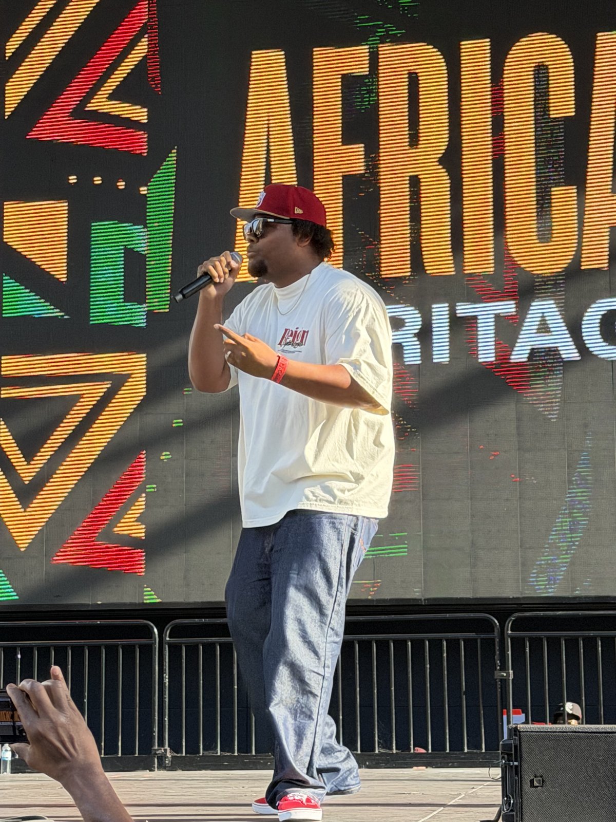Speaker on stage at African American Heritage Night, Petco Park